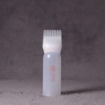 علبة توزيع الزيت للشعر